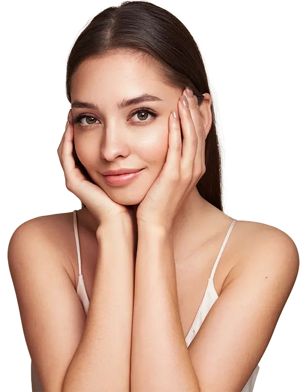 A happy woman holding her face and showing off her eyelashes. 